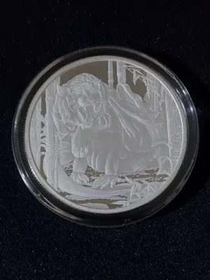 Обява: Ниуе 2022 - 1 долар - Комодски варан и Тигър , 1 OZ сребърна монета BU
