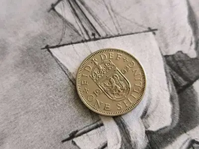 Снимка за обява „Монета - Великобритания - 1 шилинг | 1962г."