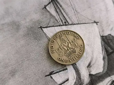 Снимка за обява „Монета - Великобритания - 1 шилинг | 1947г."