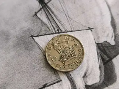 Снимка за обява „Монета - Великобритания - 1 шилинг | 1949г."