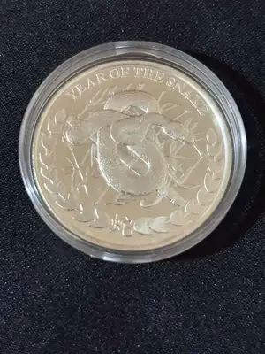 Снимка за обява „Сомалиленд 2013 - 1000 Shillings – Година на змията лунар"
