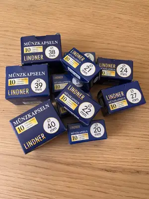 Снимка за обява „Капсули за монети 27mm LINDNER"
