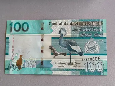 Снимка за обява „Банкнота - Гамбия - 100 даласи UNC | 2023г.“
