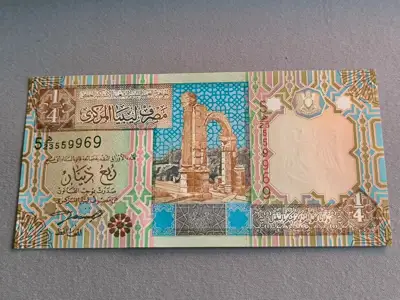 Снимка за обява „Банкнота - Либия - 1/4 (четвърт) динар UNC | 2002г.“